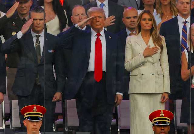 <p>US President Donald Trump yesterday hosted the military&rsquo;s largest parade in decades in Washington DC, marking 250 years of the US Army.</p>
<p>The Republican president addressed the event, which involved about 6,000 soldiers and included flyovers and fireworks.</p>
<p>Thousands attended the parade in the nation&rsquo;s capital, which fell on Trump&rsquo;s 79th birthday.</p>
<p>Image above, Trump, US Secretary of Defence Pete Hegseth and first lady Melania Trump gesture while they listen to the US national anthem during the parade.&nbsp;</p>